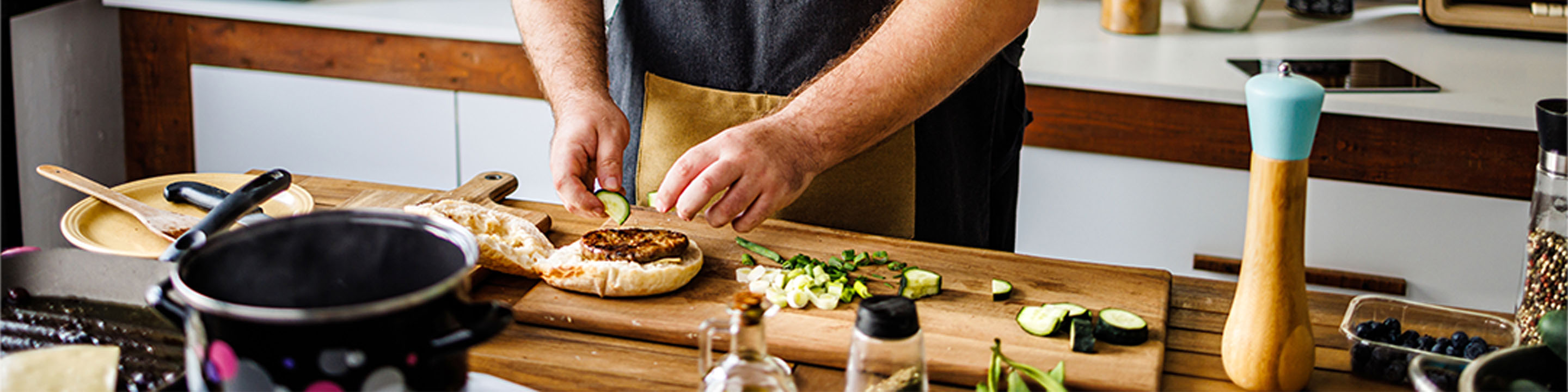 Man in the kitchen prepping a meal
