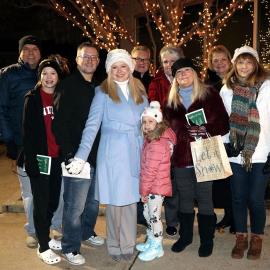 Leslie Darrow (front, in white hat) celebrates a healthy start to the new year with family members.