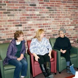 Sylvia Huerta, right, shares her story with Lung Cancer Support Group facilitator Helen Kolodziej, center, and group member Helen Powers at the Cancer Resource Centre in Munster.