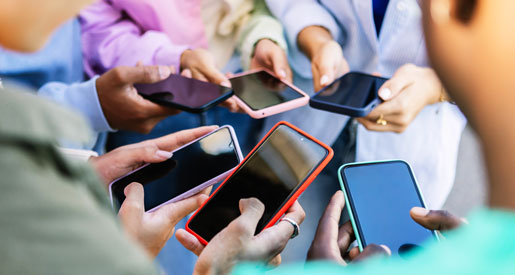 hands holding mobile phones